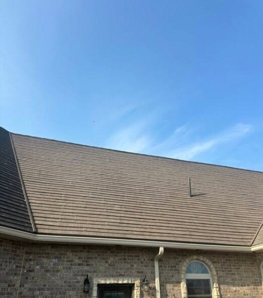 Roof after soft washing — black algae streaks removed