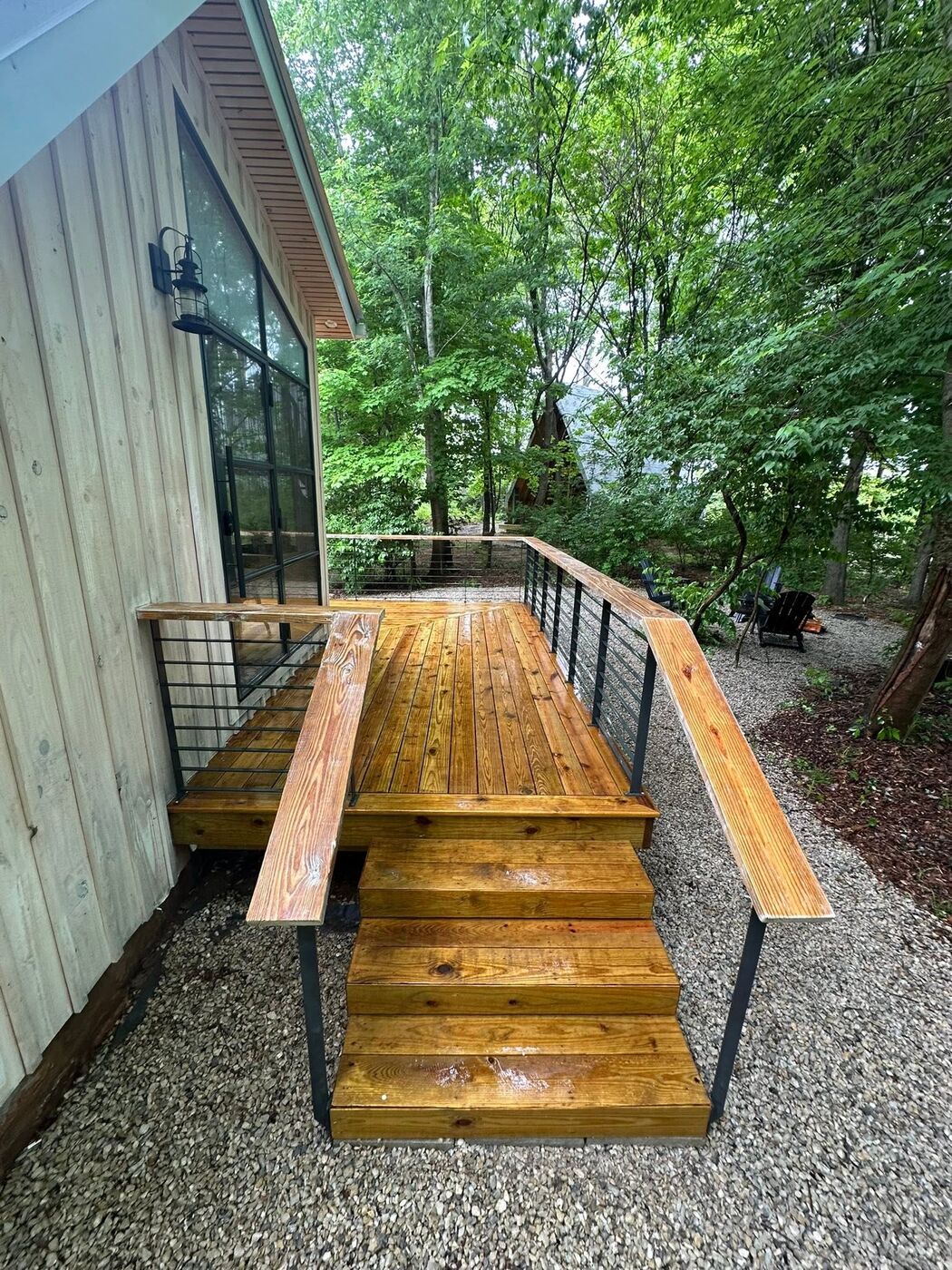Deck and steps after cleaning — warm timber colour restored
