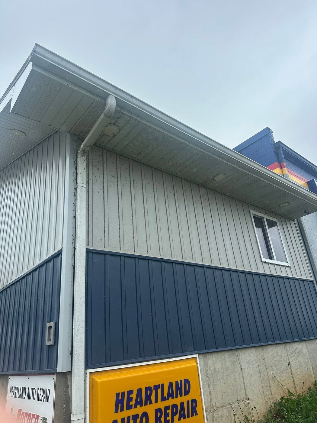 Commercial siding before cleaning