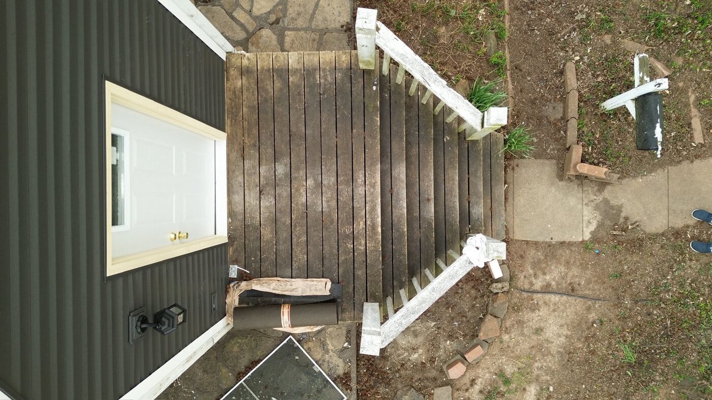 Wooden deck before washing — dark and dirty