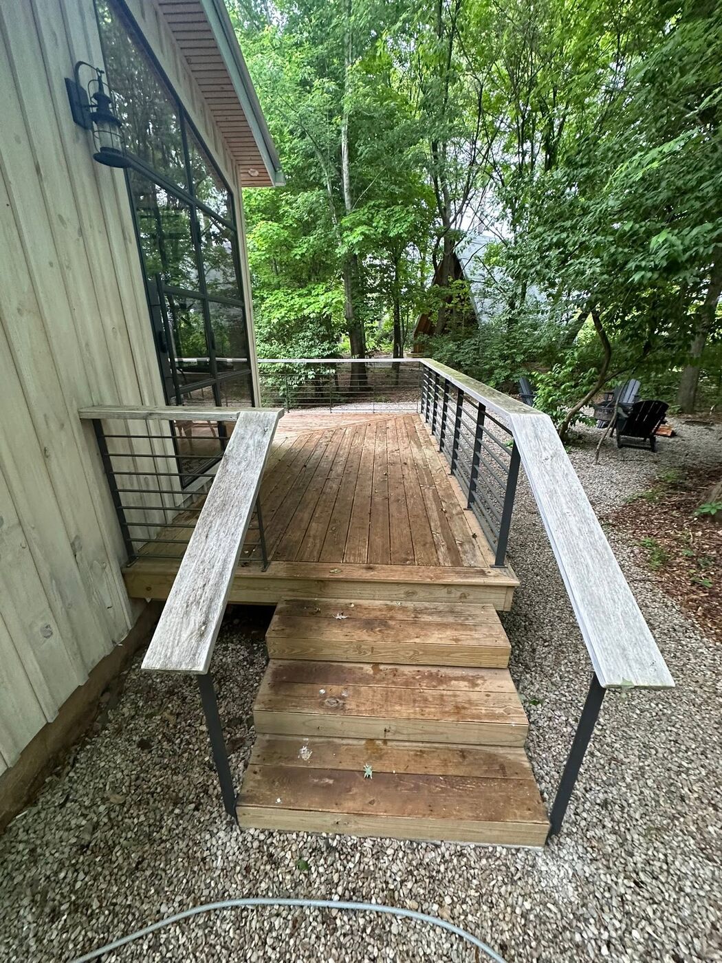 Deck and steps before cleaning — grey and weathered